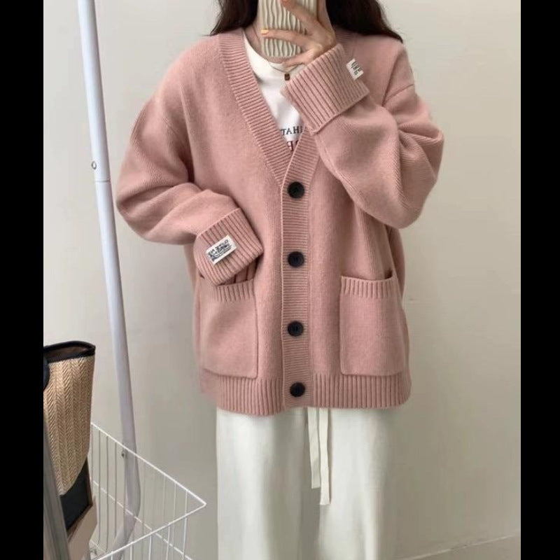 Damenes uformelle oversized cardigan med store lommer og knappdetaljer Skjora
