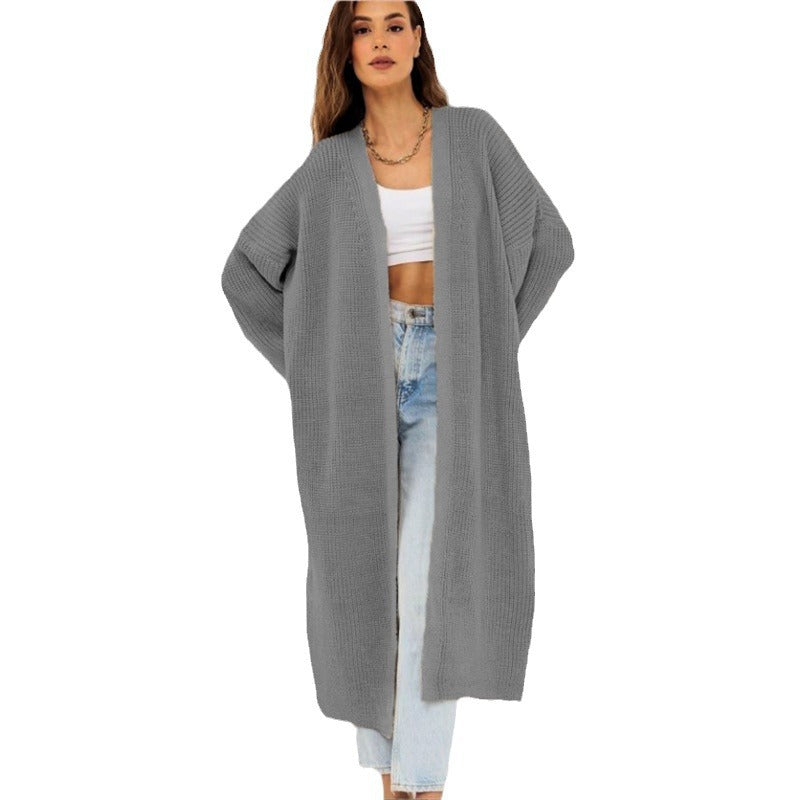 Kvinnens chunky strikk cardigan med åpen frontdesign og dype lommer Skjora