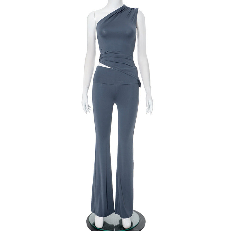 Dame asymmetrisk jumpsuit med dekorativt innviklet design og mykt, elastisk materiale Skjora