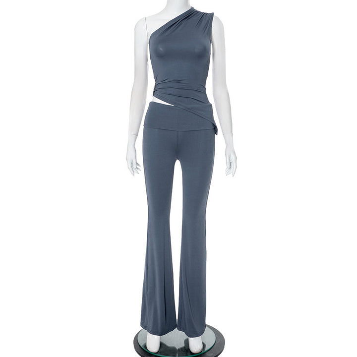 Dame asymmetrisk jumpsuit med dekorativt innviklet design og mykt, elastisk materiale Skjora