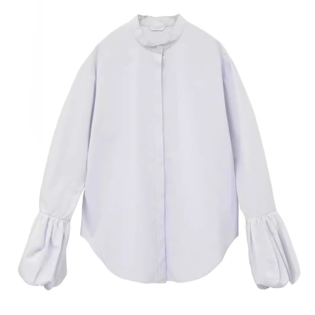 Dame Elegant bluse med voluminøse ermer og ståkrage Skjora