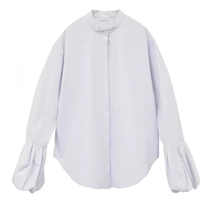 Dame Elegant bluse med voluminøse ermer og ståkrage Skjora