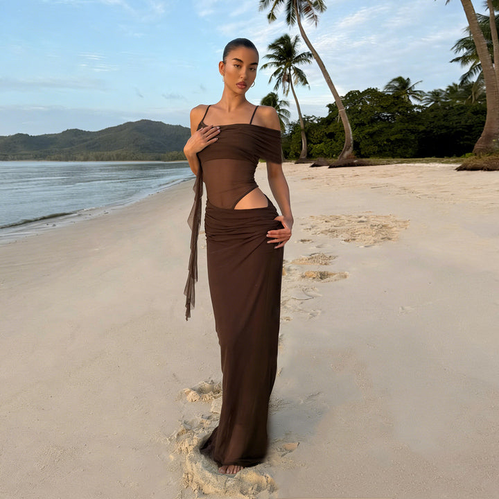 Elegant women's evening dress with refined ruffle details and transparent inserts Skjora