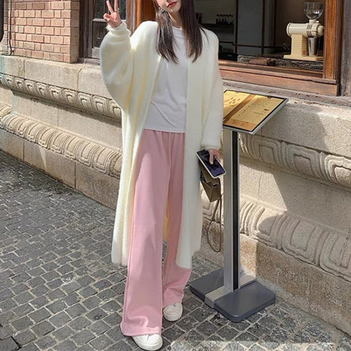 Kvinnes Fluffy Maxi Cardigan med Dyp V-Hals og Oversized Silhuett Skjora