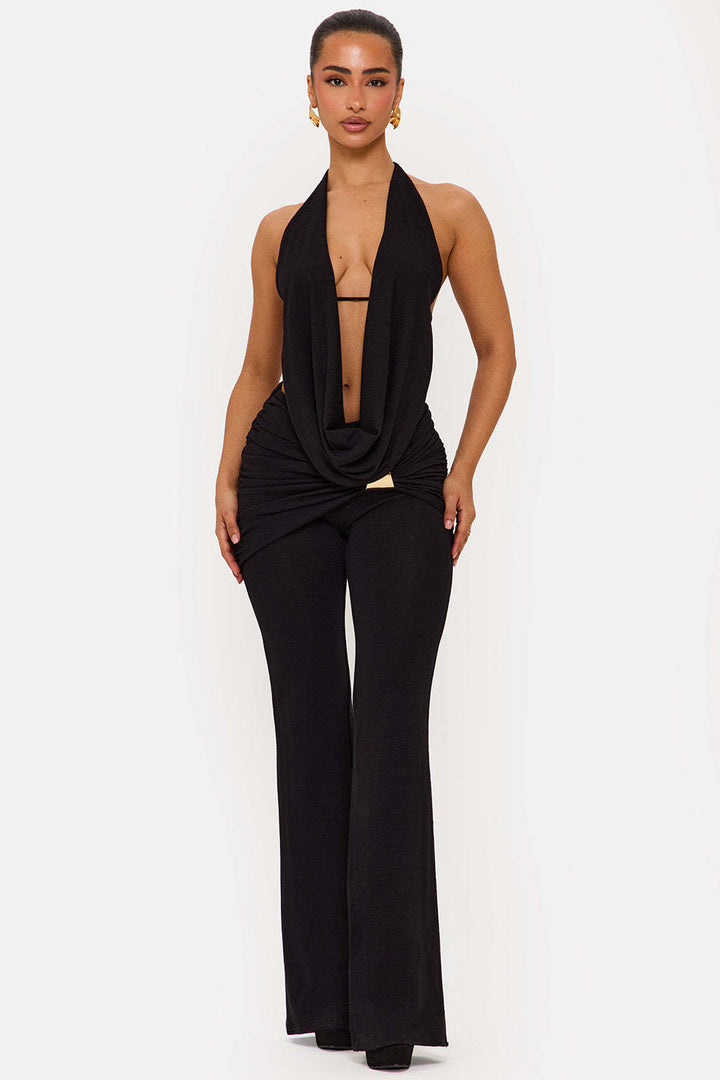 Damer elegant, figurnær jumpsuit med dyp utringning og vide ben Skjora