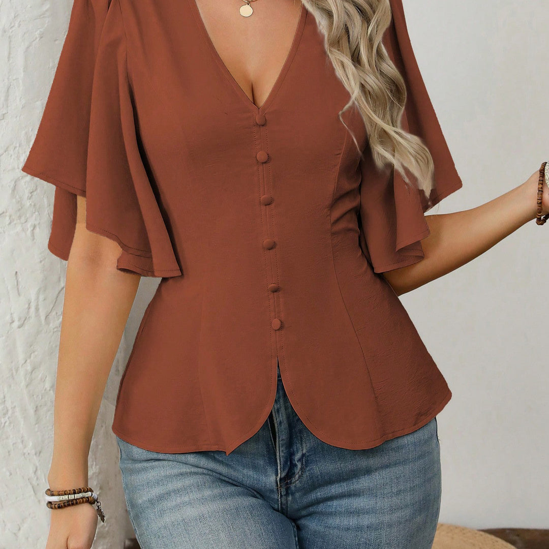 Dame elegant bluse med klokkeermer og knappdetalj Skjora