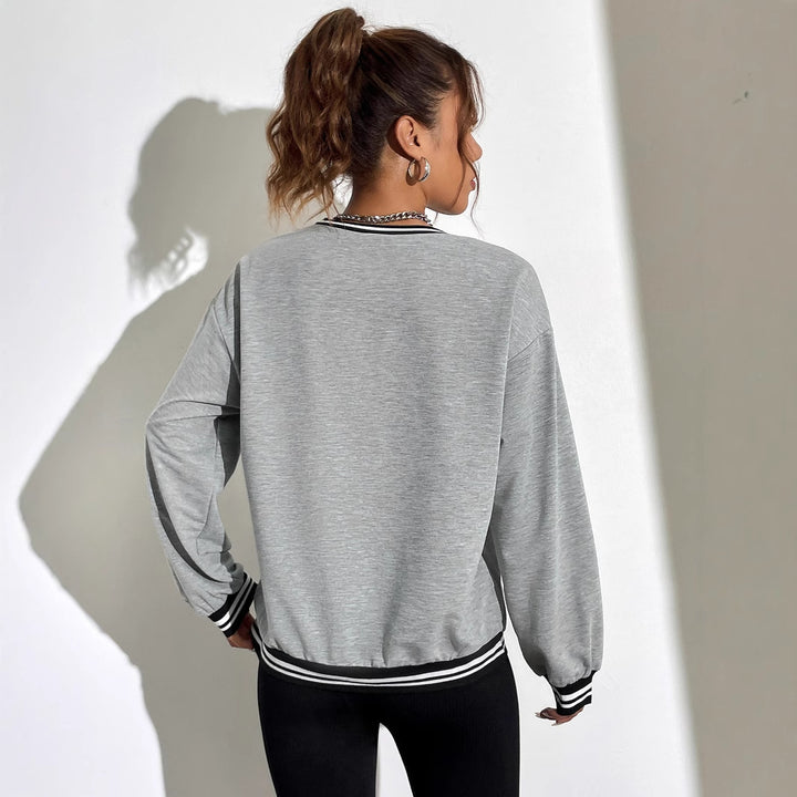 Dame avslappet sweatshirt med trykt Hawaii-motiv og senkede skuldre Skjora