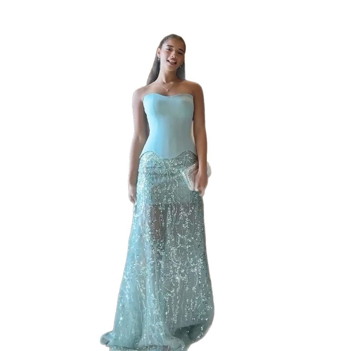 Kjole for damer med glitrende topp og elegant broderi
