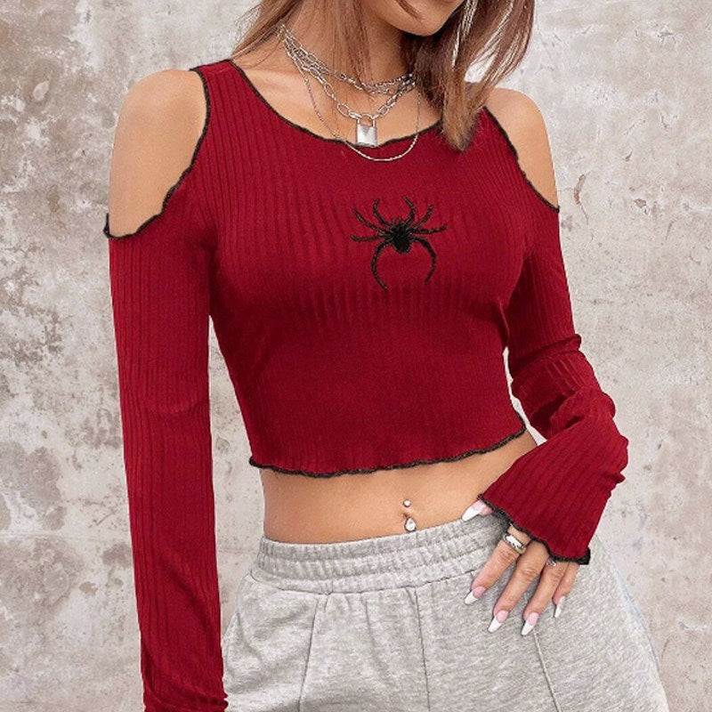 Dame cropped topp med off-shoulder design og Spider-motiv Skjora