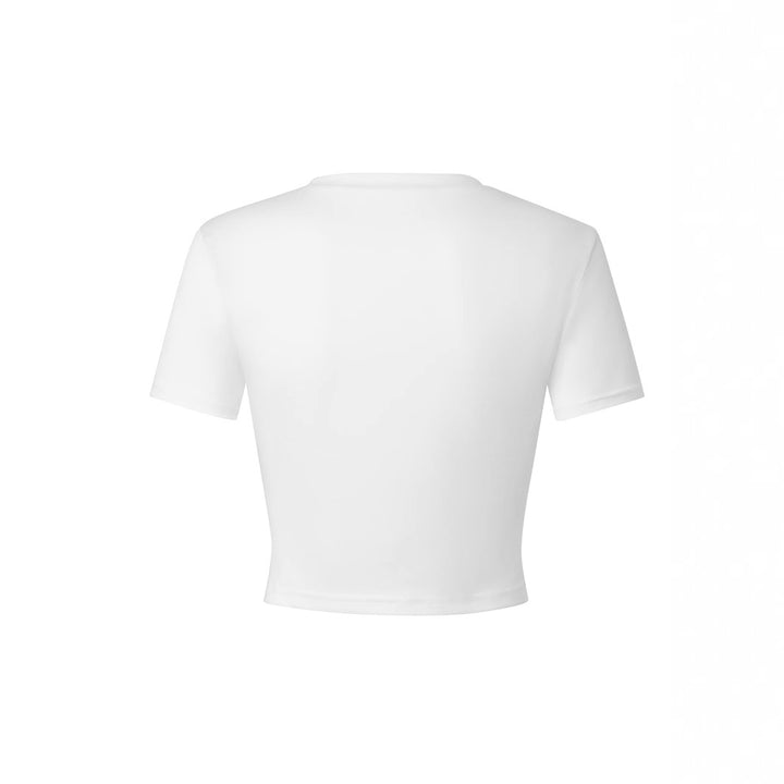 Dame Cropped-Topp med kreativt skjell-design og leken tekst Skjora