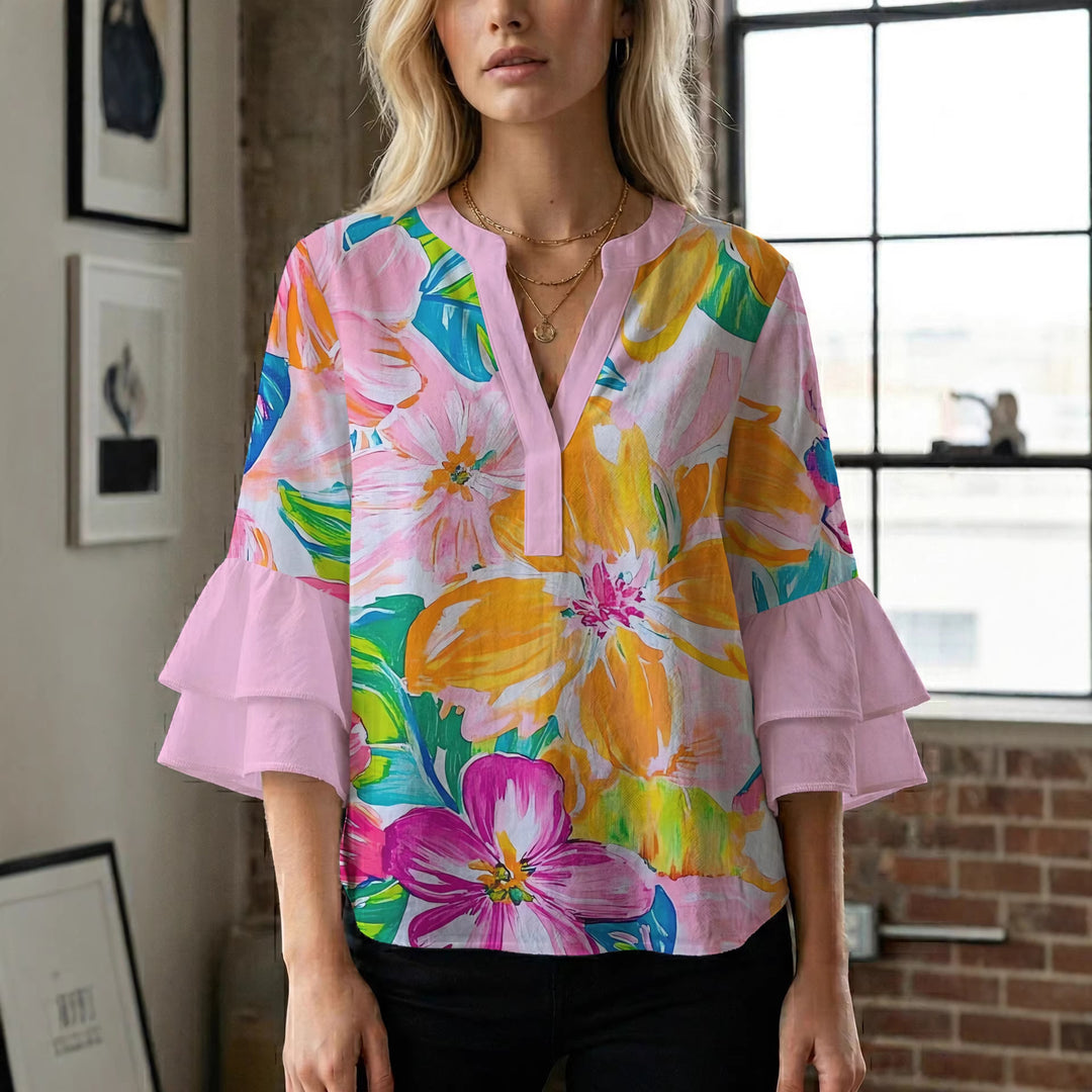 Damenbluse med voluminøse rysjermer og blomstermønster Skjora