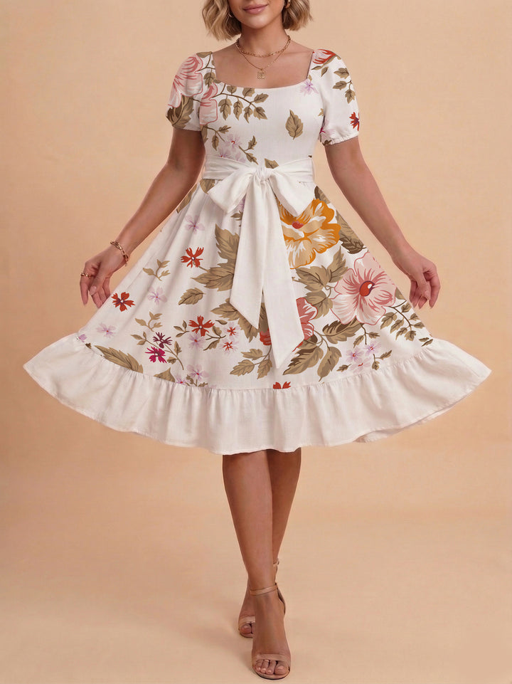 Damen Sommerliches Blumenkleid mit taillierbarem Gürtel und voluminösen Ärmeln Skjora