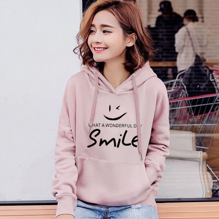 Dame hettegenser med gledelig smile-print Skjora