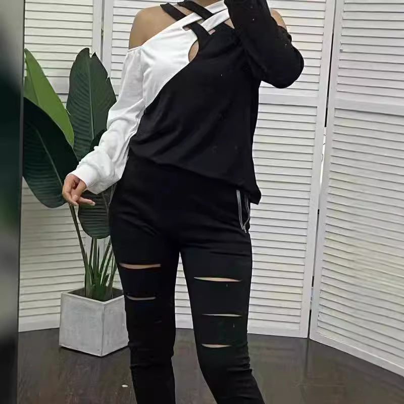 Dame Modisk topp med cut-out-design og asymmetrisk ermer Skjora