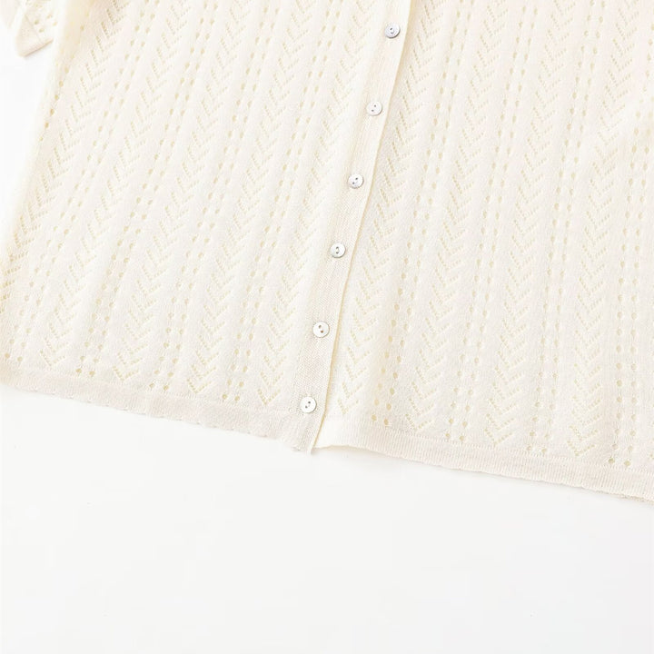 Dame strikket crop-top med V-hals og knapplukking Skjora