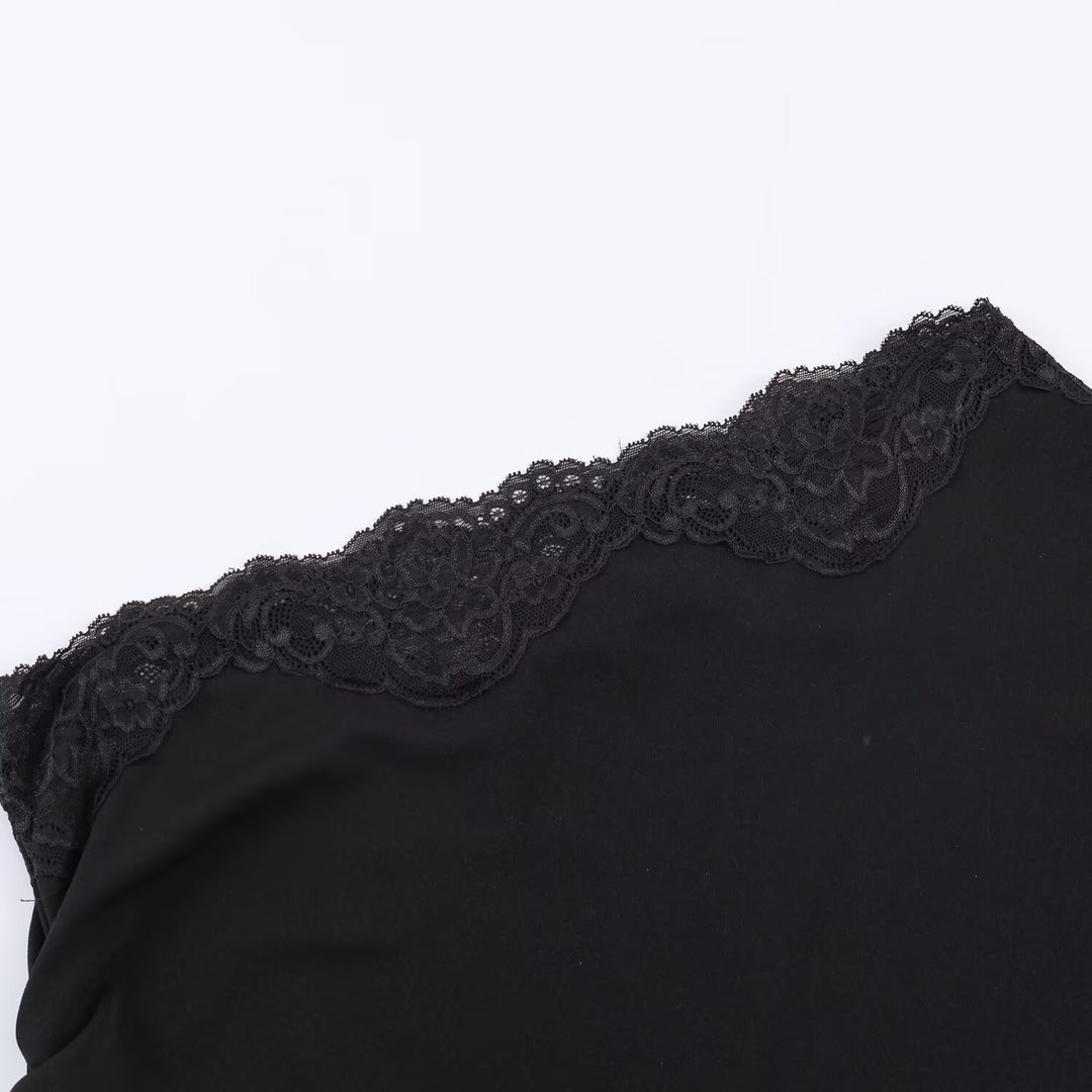 Damer asymmetrisk spiss-overdel med elegante volangdetaljer Skjora