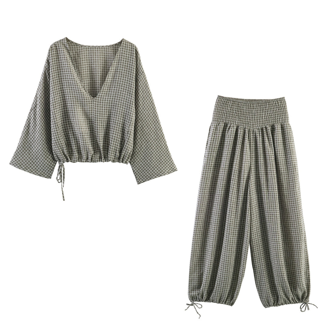 Damer casual bluse med vid V-hals og elastisk kant Skjora
