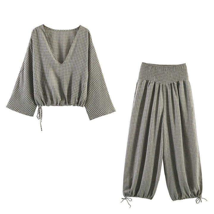 Damer casual bluse med vid V-hals og elastisk kant Skjora