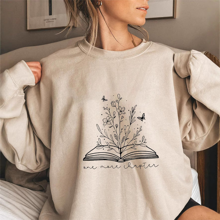 Kvinne genser med elegant blomst design og inspirerende trykk Skjora