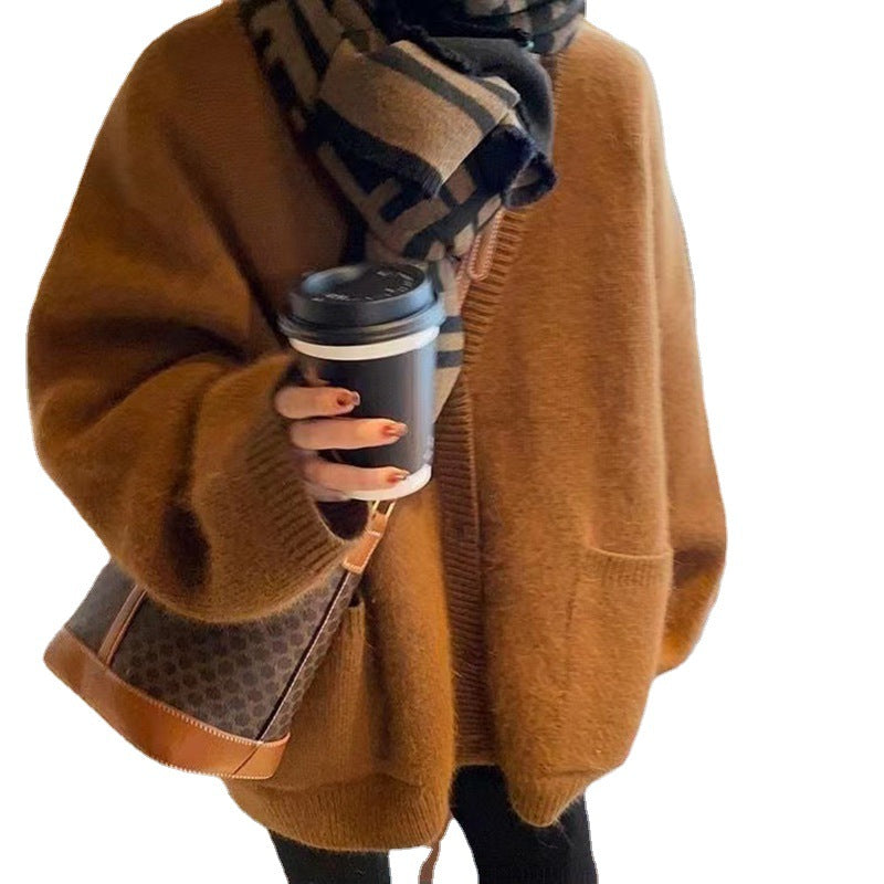 Dames oversized strikket cardigan med dype lommer og teksturerte detaljer Skjora