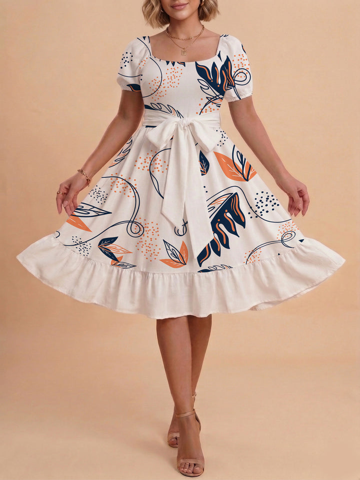 Damen Sommerliches Blumenkleid mit taillierbarem Gürtel und voluminösen Ärmeln Skjora