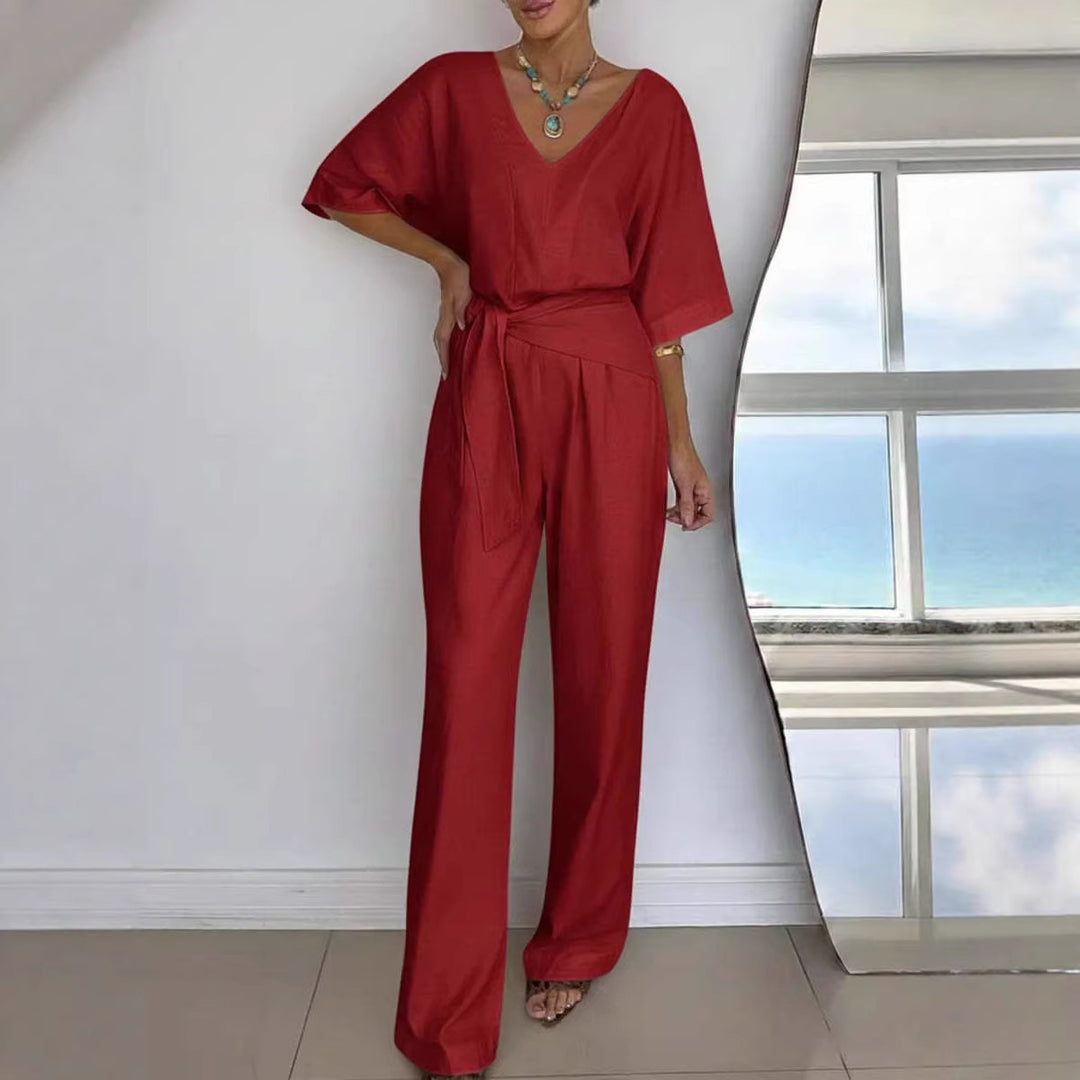Damer Elegant Jumpsuit med Skreddersydd Snitt og Innpakket Belte Skjora
