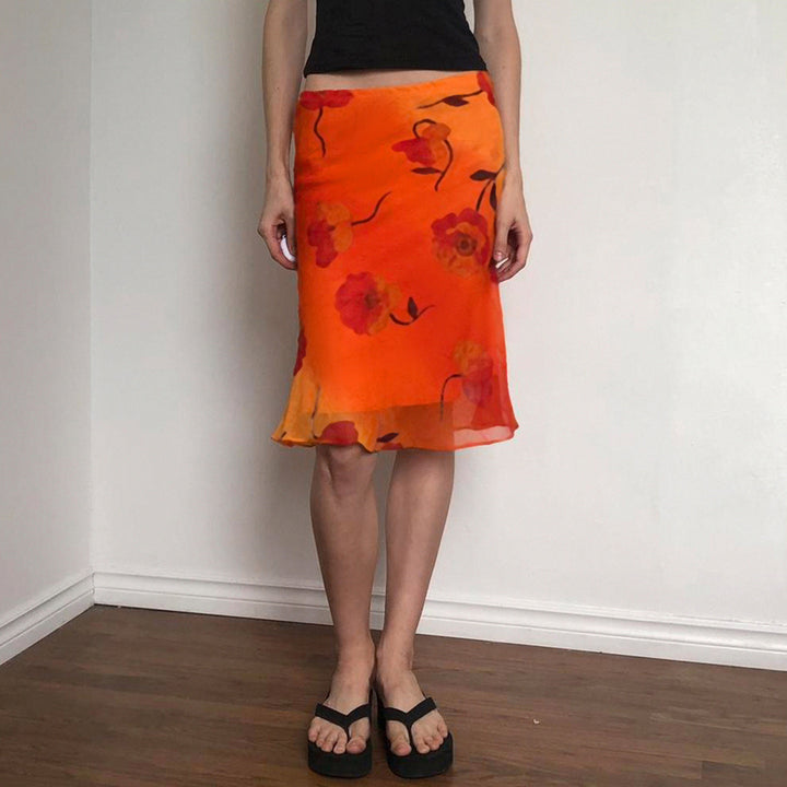 Ladies' airy maxi skirt with floral design Skjora