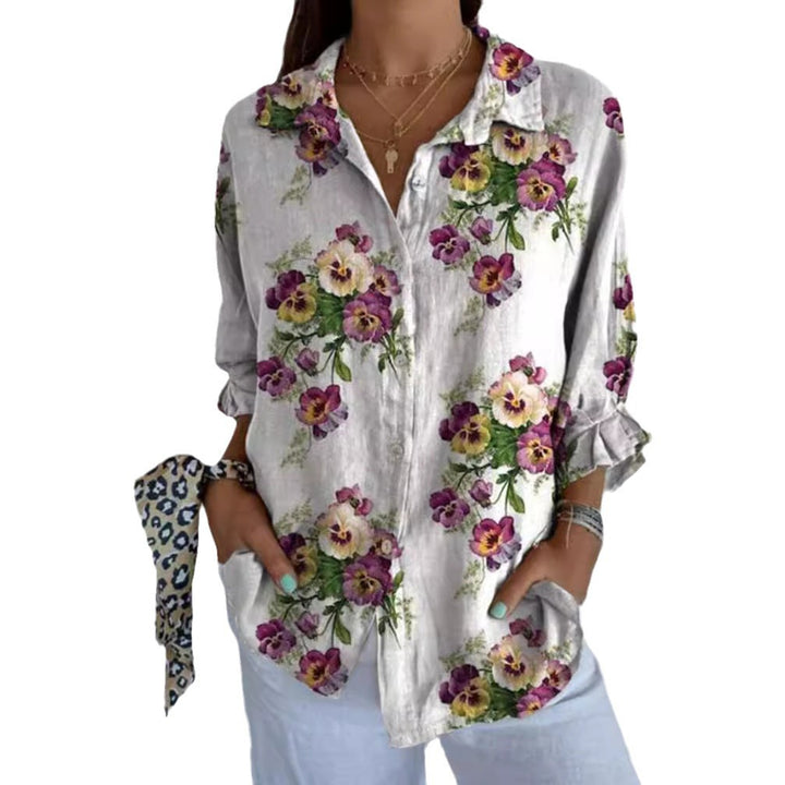 Damebluse i blomsterdesign med skjult knappelukking Skjora