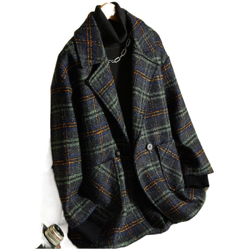 Klassisk rutet jakke for kvinner i moteriktig oversized stil Skjora