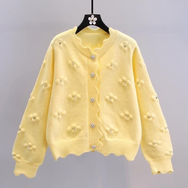 Kvinnenes koselige cardigan med blomsterapplikasjoner Skjora