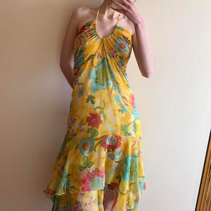 Dame Maxi-kjole med blomsterdetaljer og dyp V-hals Skjora