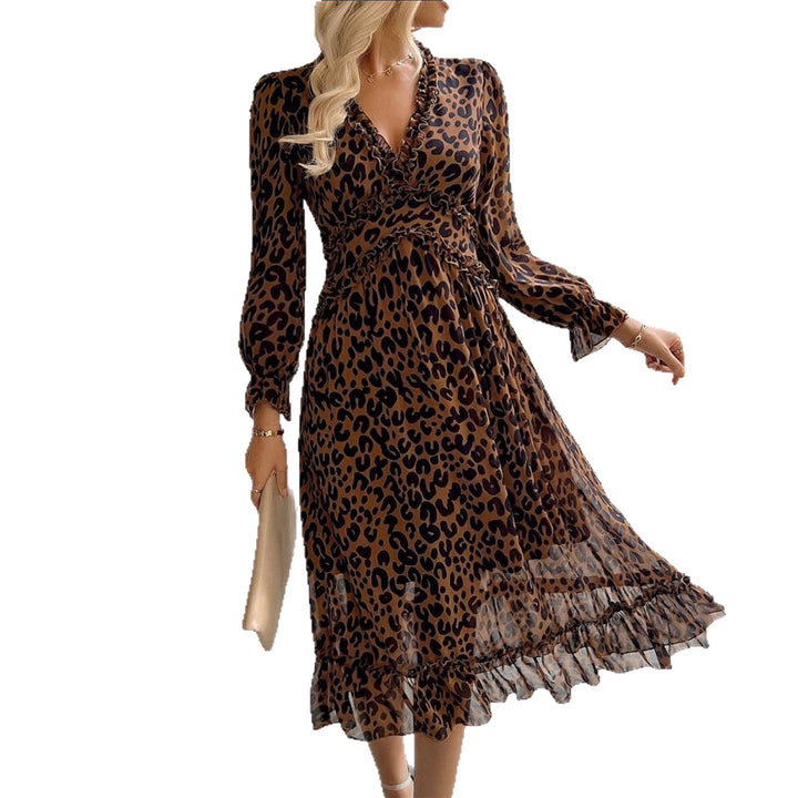 Dame maxi kjole med elegant leopardmønster og voluminøse ermer