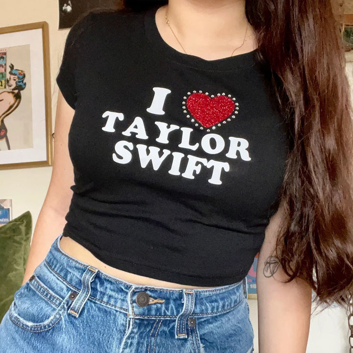 Damer cropped T-skjorte med glitrende skrifttype og trendy bomullsmateriale Skjora