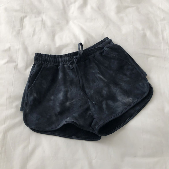 Kvinne casual sweatshorts med trendy tie-dye design og praktiske sidelommer
