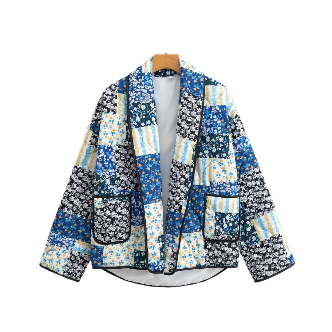 Kvinne patchwork quilted jakke med blomster detaljer og løs passform Skjora