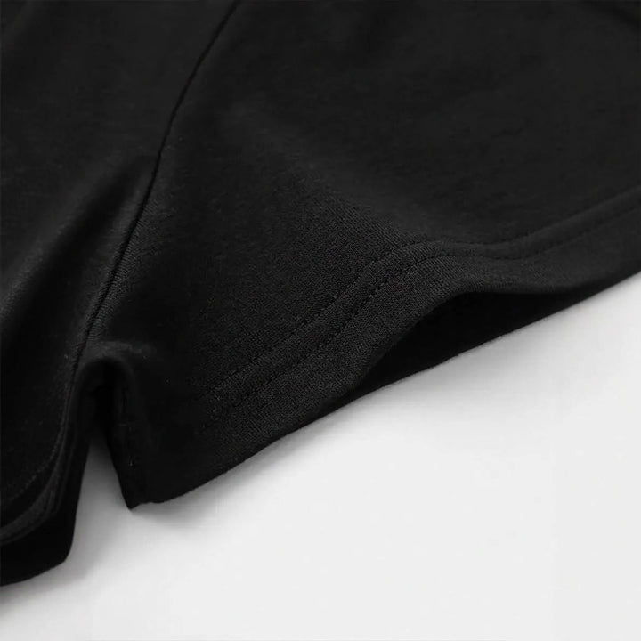 Dame T-skjorte med kreativt skrift og elegante perleaksenter Skjora