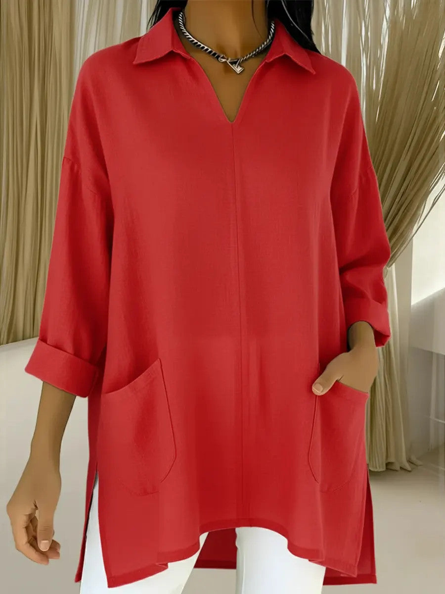 Dame langermet bluse med elegant V-hals og praktiske lommer Skjora
