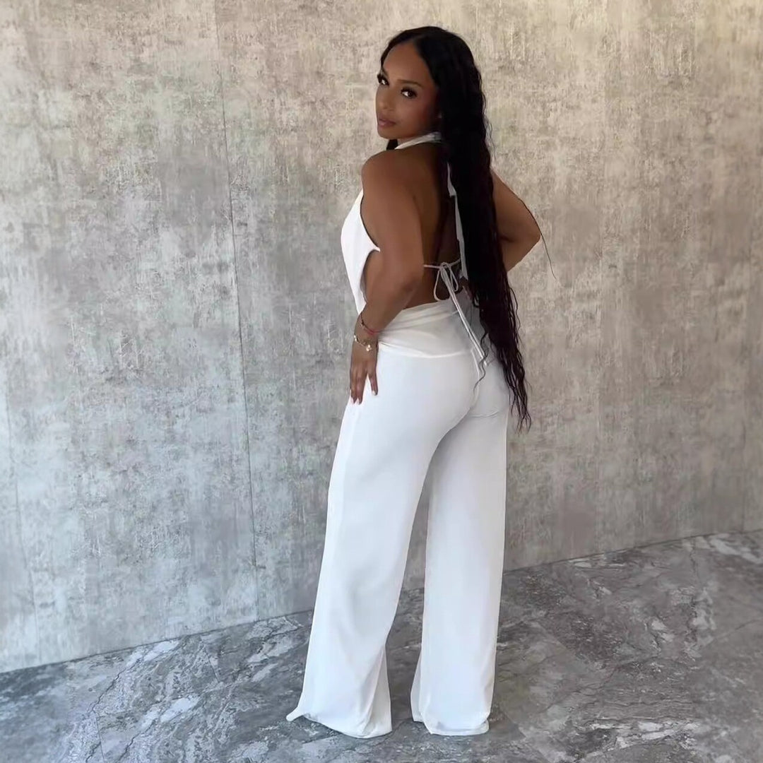 Dame jumpsuit med elegant innpakningsdetalj og vide benpartier Skjora