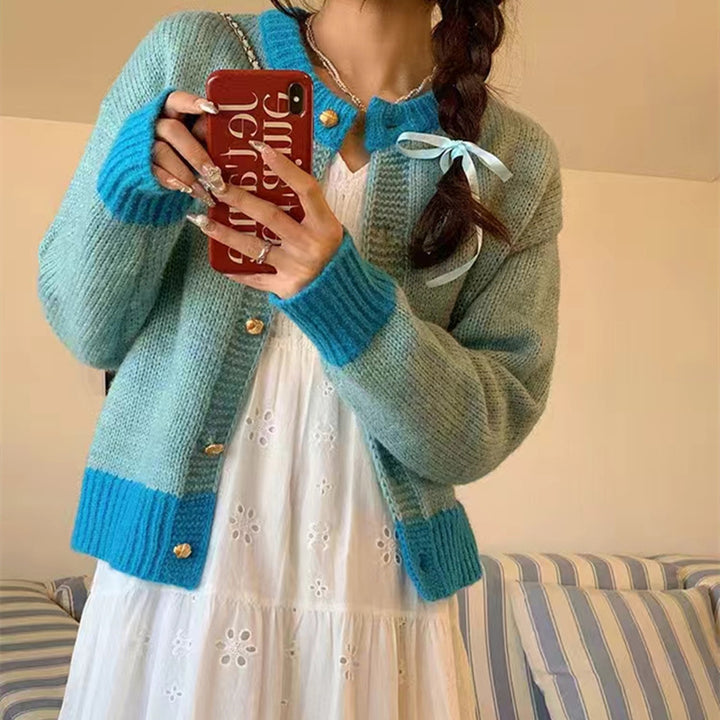 Dame cardigan med kontrasterende mansjetter og knappdetaljer Skjora