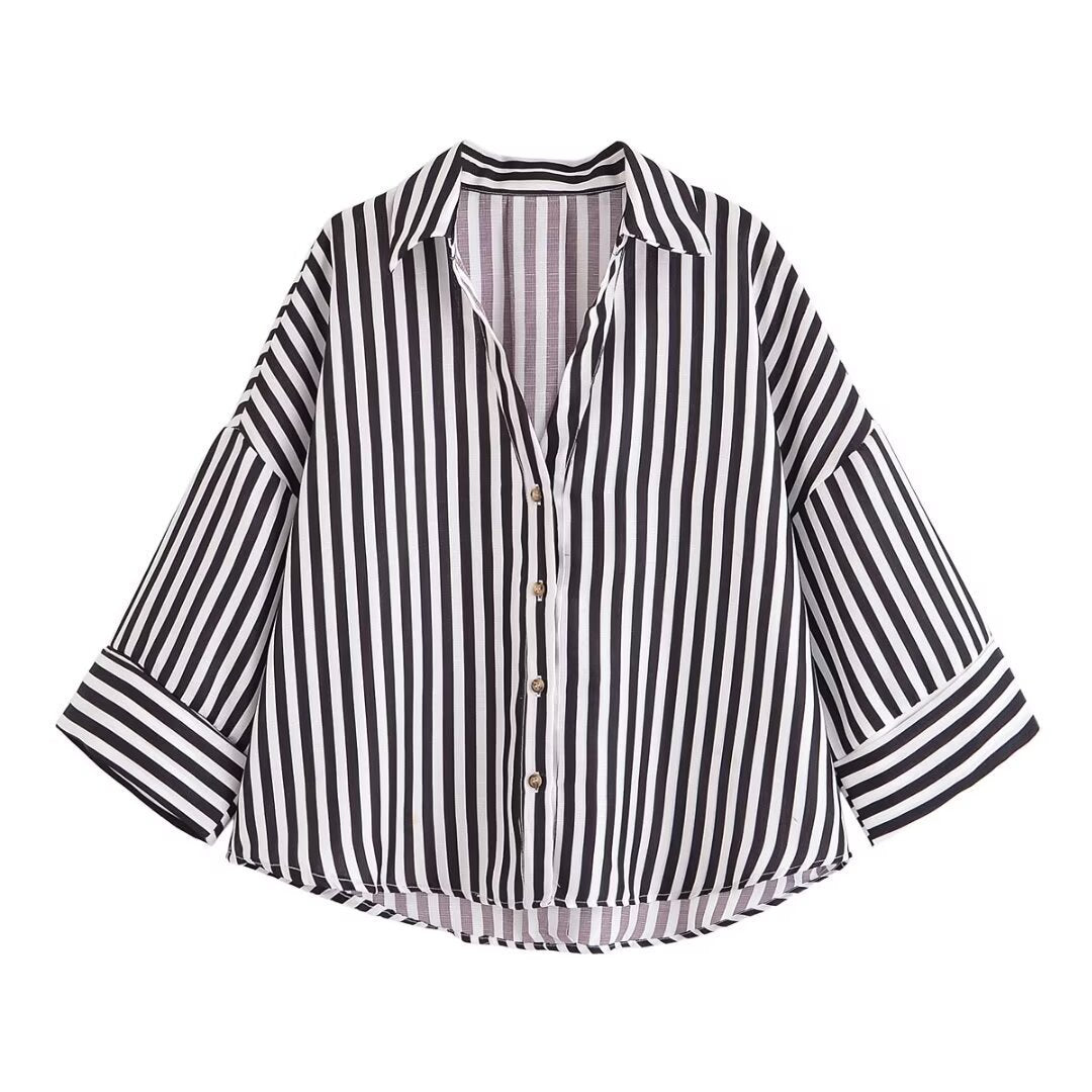 Dame skjorte-bluse med avslappet snitt og elegante 3/4-ermer Skjora