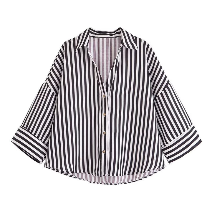 Dame skjorte-bluse med avslappet snitt og elegante 3/4-ermer Skjora