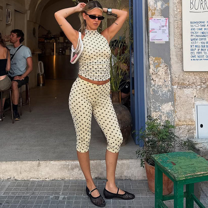 Damer sporty bodysuit med moteriktig prikkete mønster Skjora