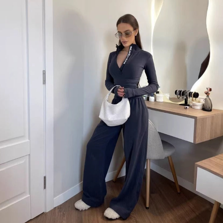 Dame joggedress med moteriktig glidelås og lange ermer Skjora