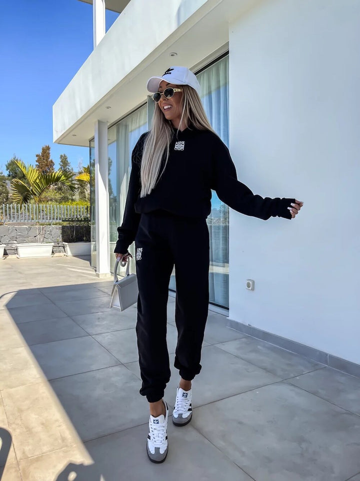 Dame sporty loungewear-set med hette og elastiske mansjetter Skjora
