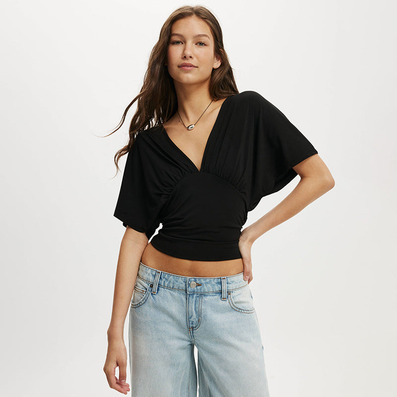 Damer elegant topp med avslappet snitt og trendy V-hals Skjora