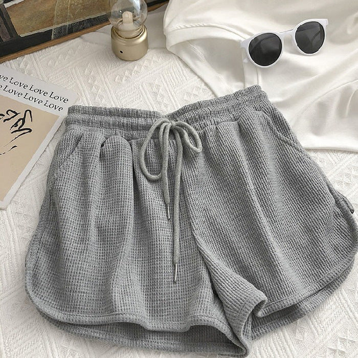 Kvinnelige casual shorts med vaffelstruktur og justerbar snorlås og elastisk midjebånd