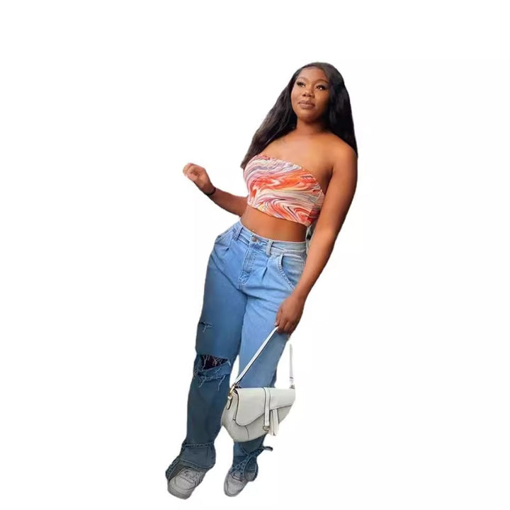 Uformelle kvinne mom jeans med trendy ødelagt utseende Skjora