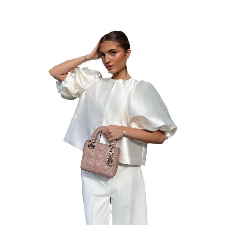 Dame stilfull bluse med ballonglignende ermer og elegant snitt Skjora