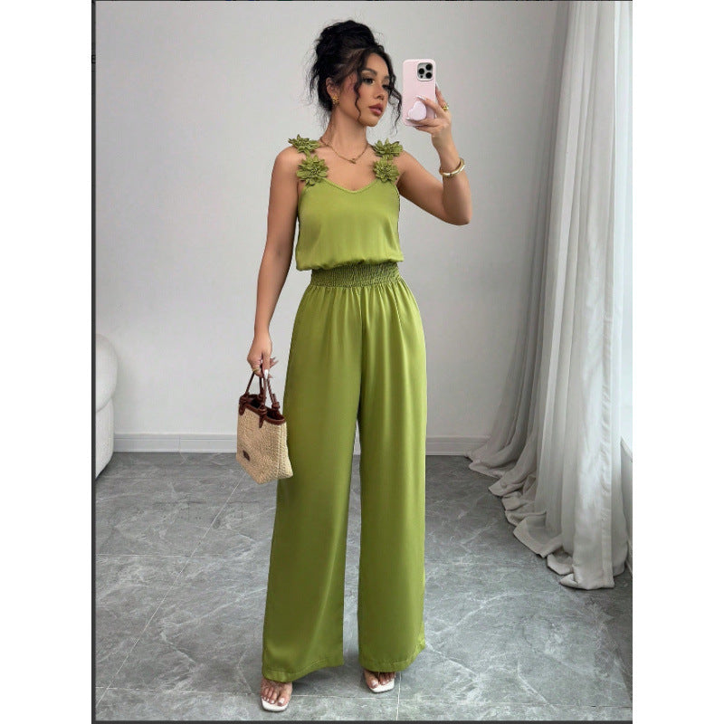 Dame jumpsuit med blomstrete volanger og vide ben Skjora