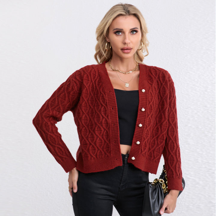 Women's designer cardigan with cable pattern and soft colors Skjora